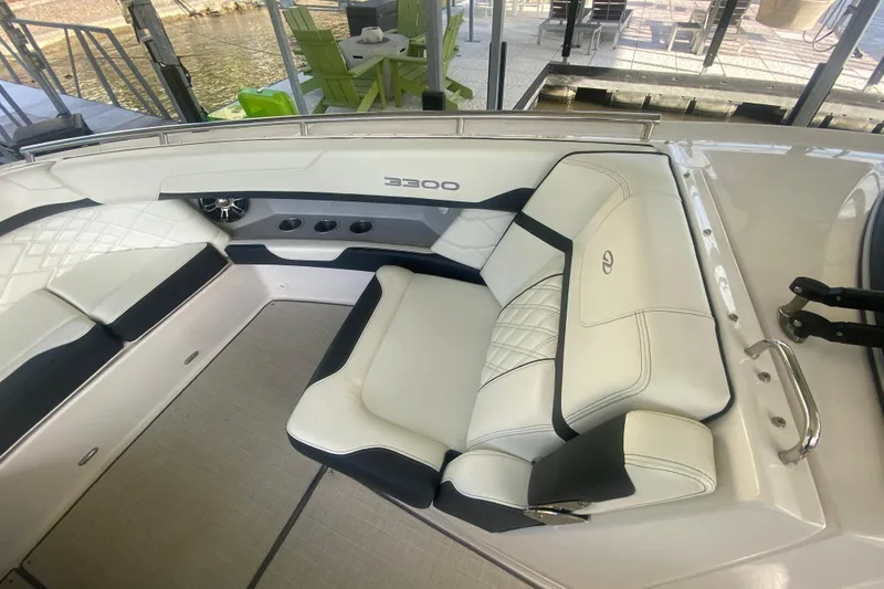 Slide: The Image of 2021 Regal 3300 Bowrider interior with luxurious white seating and modern design. - 30