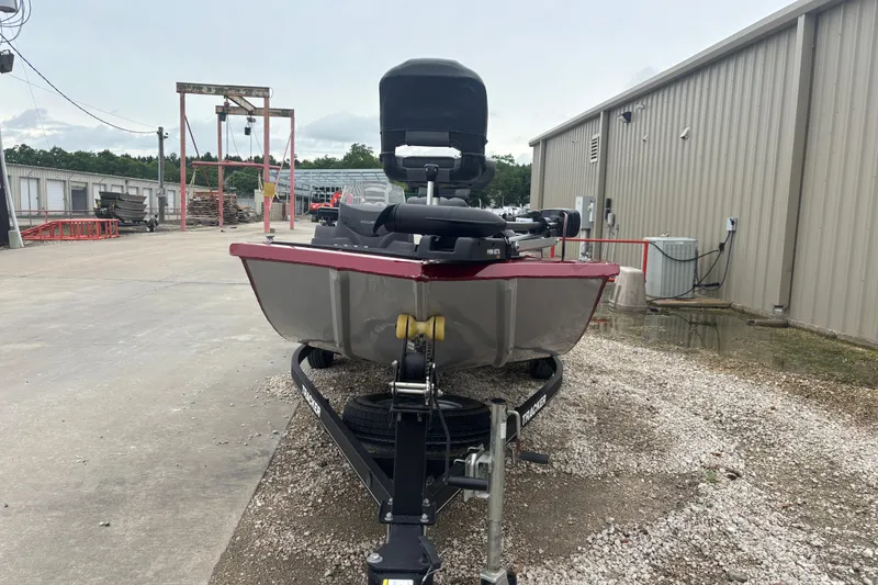 Slide: The Image of 2020 Tracker Pro 170 boat on trailer in industrial area. - 5
