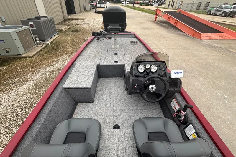 Slide: The Image of 2020 Tracker Pro 170 boat interior with steering console and seating. - 7