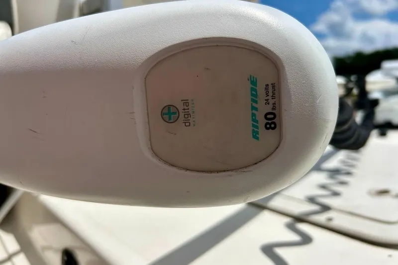 Slide: The Image of Close-up of a Riptide motor on a 2008 Hurricane FunDeck 226 RE boat. - 18