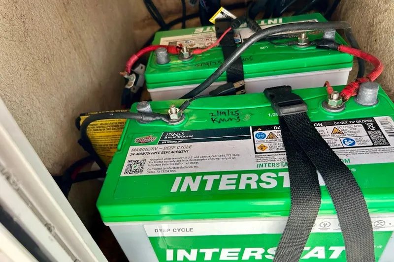 Slide: The Image of Green Interstate deep cycle batteries in a 2008 Hurricane FunDeck 226 RE boat. - 26
