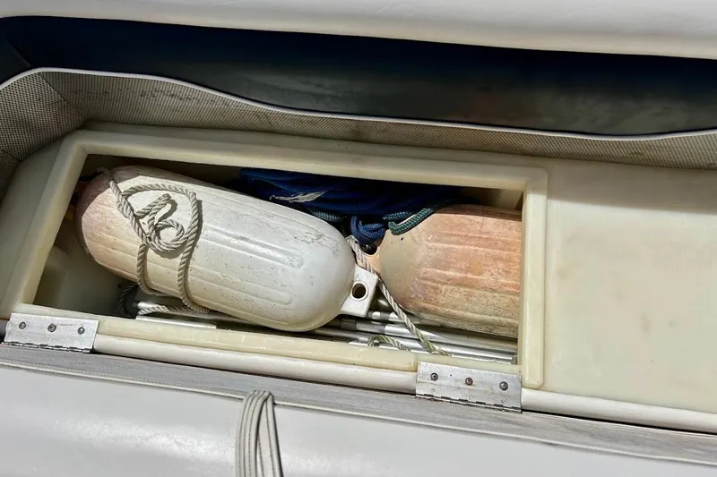 Slide: The Image of Storage compartment on a 2008 Hurricane FunDeck 226 RE boat with fenders and ropes. - 27