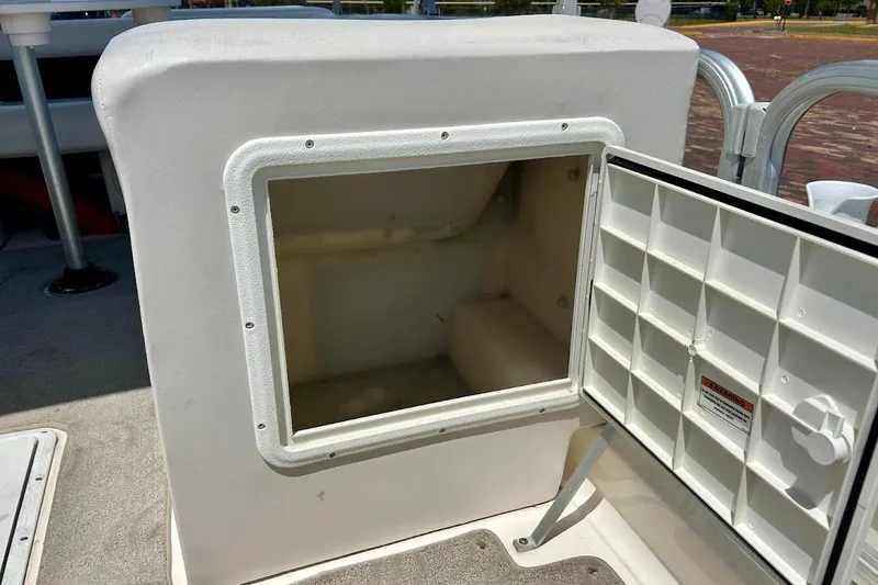Slide: The Image of Open storage compartment on a 2008 Hurricane FunDeck 226 RE boat. - 29