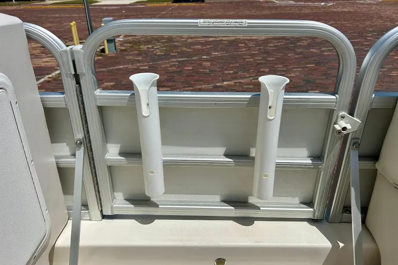 Slide: The Image of 2008 Hurricane FunDeck 226 RE boat with rod holders on the deck railing. - 30