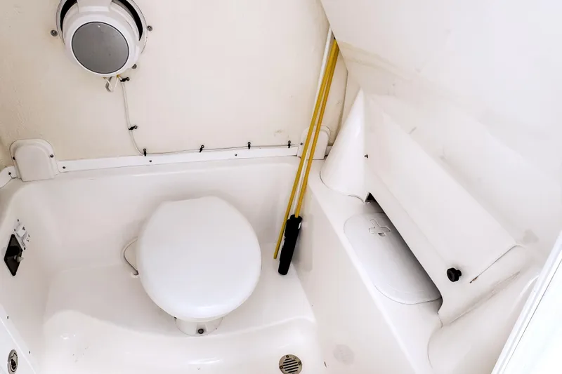 Slide: The Image of Interior of 2023 Tidewater 280 CC Adventure featuring toilet and storage space. - 30