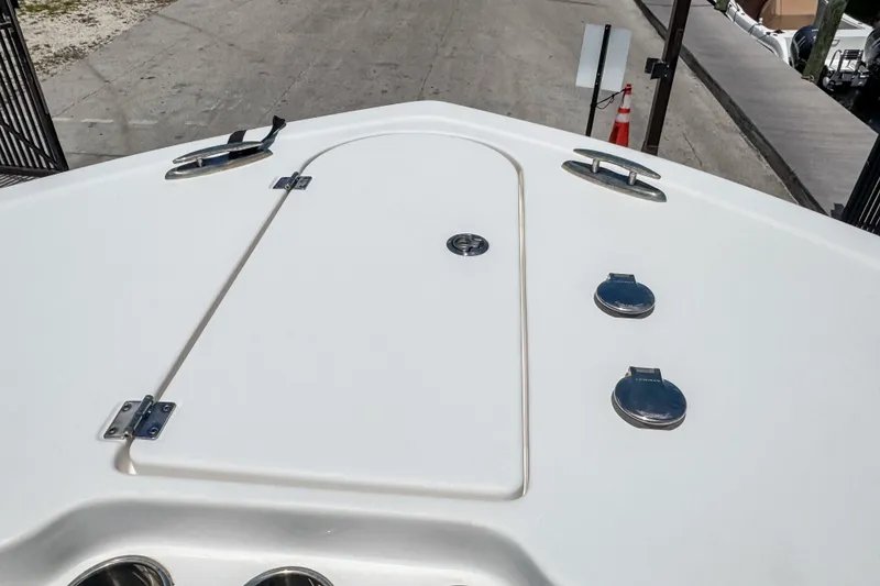 Slide: The Image of 2023 Tidewater 280 CC Adventure boat deck with hatch and cleats. - 34