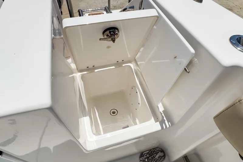 Slide: The Image of Open storage compartment on 2023 Tidewater 280 CC Adventure boat. - 36