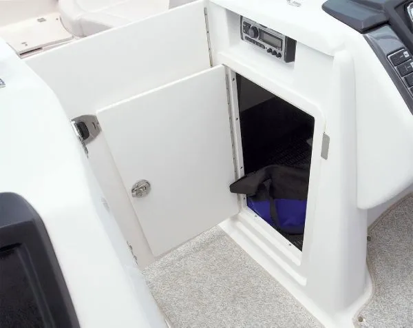 Slide: The Image of Manufacturer Provided Image: Open storage compartment on a 2012 Chaparral 244 Sunesta boat. - 18
