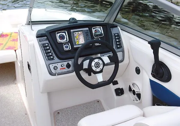 Slide: The Image of Manufacturer Provided Image: 2012 Chaparral 244 Sunesta boat cockpit with steering wheel and control panel. - 19