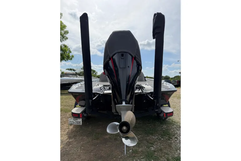 Slide: The Image of Rear view of a 2019 Phoenix 920 ProXP boat with motor and dual power poles. - 8
