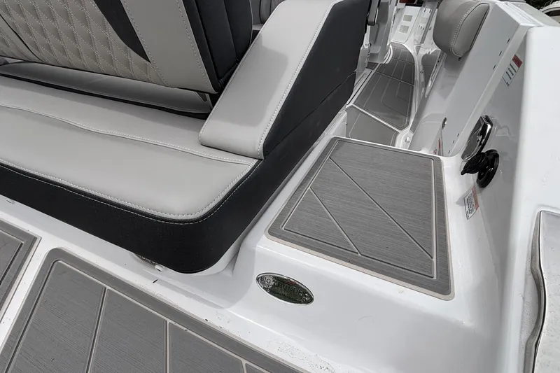 Slide: The Image of Luxurious seating and deck of 2026 Monterey Elite 30 OB boat. - 12