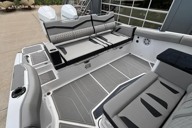 Slide: The Image of 2026 Monterey Elite 30 OB boat interior with luxurious seating and modern design. - 20