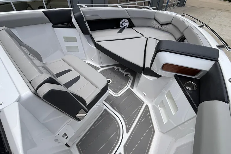 Slide: The Image of Luxurious interior of 2026 Monterey Elite 30 OB boat with sleek seating and modern design. - 57