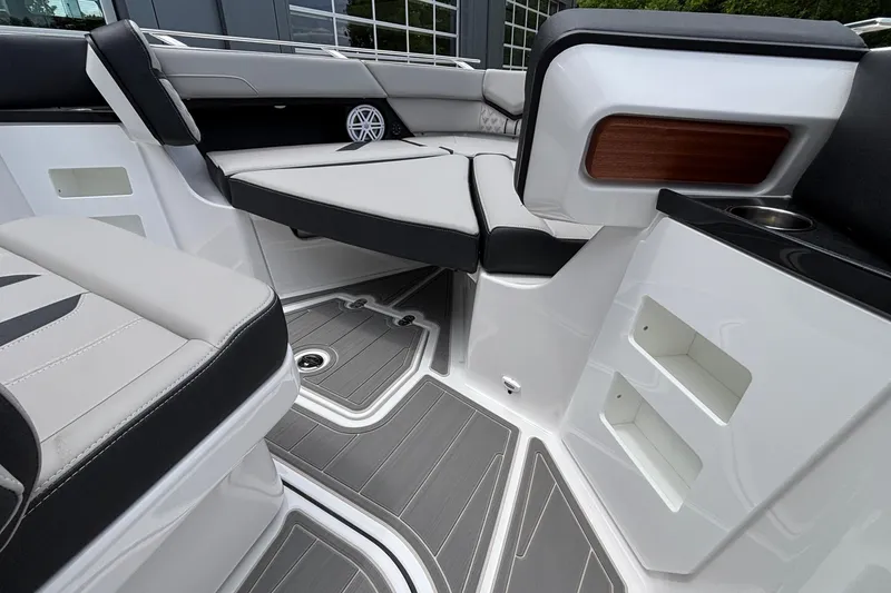 Slide: The Image of Luxurious interior of 2026 Monterey Elite 30 OB boat with sleek seating and modern design. - 58