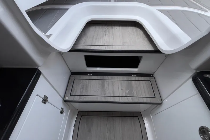 Slide: The Image of Interior view of 2026 Monterey Elite 30 OB boat with sleek, modern design. - 71