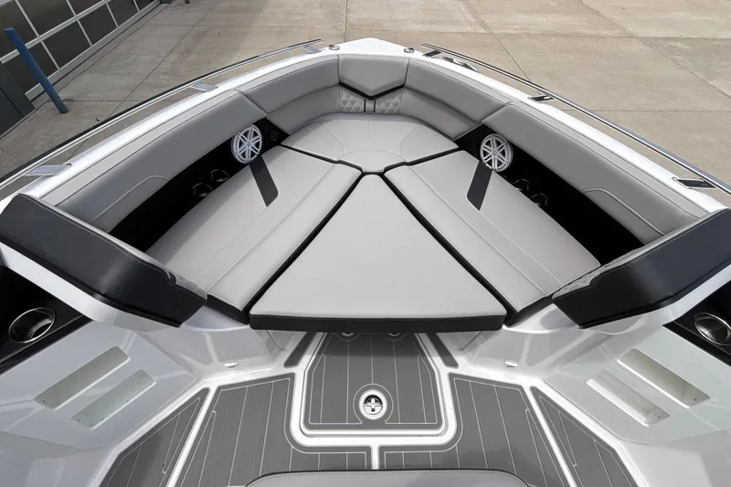 Slide: The Image of Luxurious seating area on 2026 Monterey Elite 30 OB boat, featuring sleek design and premium materials. - 79