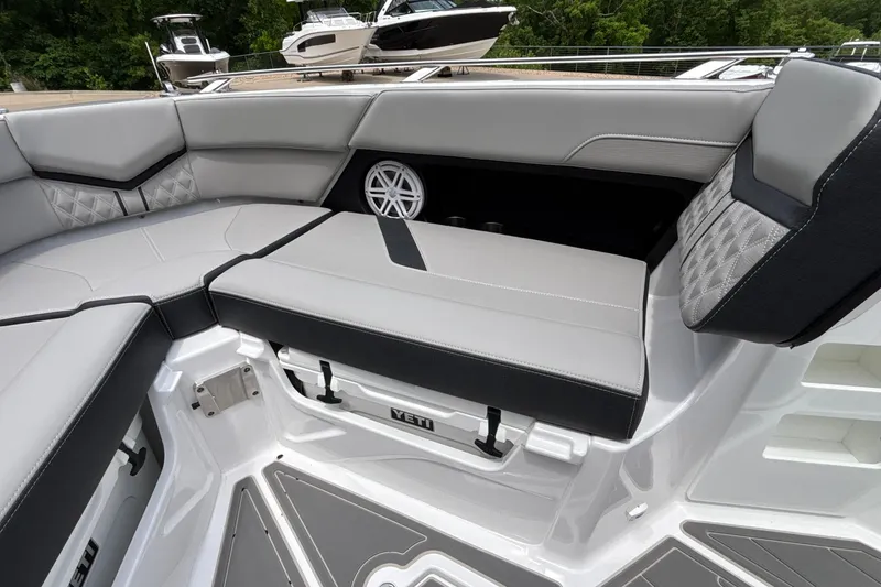Slide: The Image of Luxurious seating on the 2026 Monterey Elite 30 OB boat, featuring sleek design and premium materials. - 82