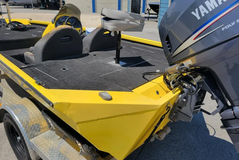 Slide: The Image of Yellow Excel 1751 F4 boat with Yamaha engine, 2011 model, on a trailer. - 10