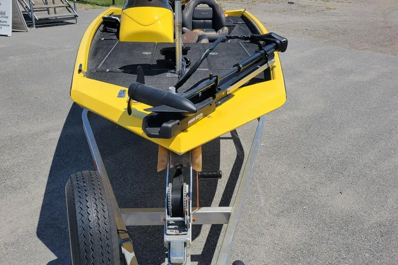 Slide: The Image of Yellow Excel 1751 F4 boat on trailer, 2011 model, with trolling motor. - 2