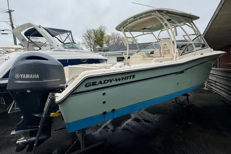 The Image of 2019 Grady-White Freedom 275 boat with Yamaha engine, displayed outdoors. - 0