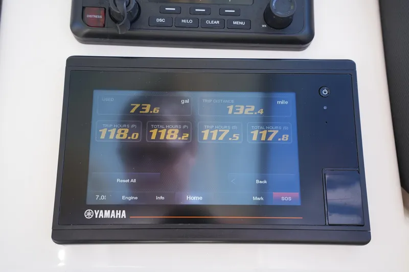 Slide: The Image of Yamaha display on 2022 Grady-White Freedom 285 showing fuel usage and trip data. - 24