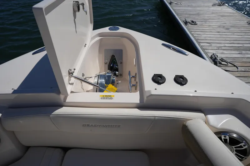 Slide: The Image of 2022 Grady-White Freedom 285 boat with open anchor locker at dock. - 30