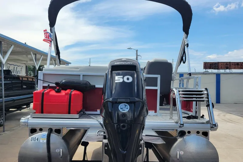 Slide: The Image of 2026 Sun Tracker Bass Buggy 16 XL Select pontoon boat with Mercury 50 engine. - 5