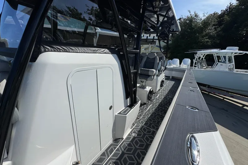 Slide: The Image of 2022 Invincible 46 Catamaran interior with sleek seating and modern design elements. - 20