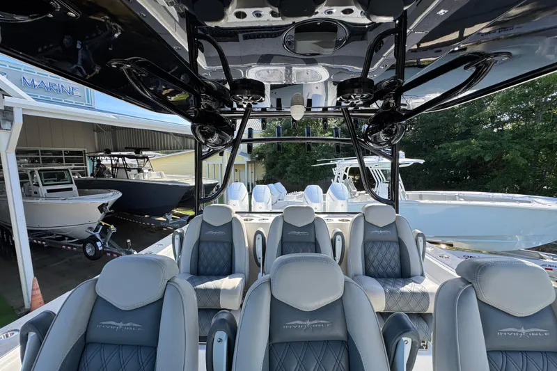 Slide: The Image of Interior view of 2022 Invincible 46 Catamaran with luxurious seating and sleek design. - 26