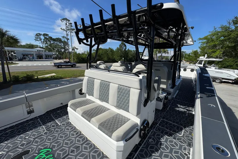 Slide: The Image of 2022 Invincible 46 Catamaran interior with cushioned seating and modern design. - 36
