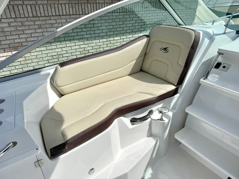 Slide: The Image of Interior of 2019 Monterey SPORT YACHT 295 with beige seating. - 10