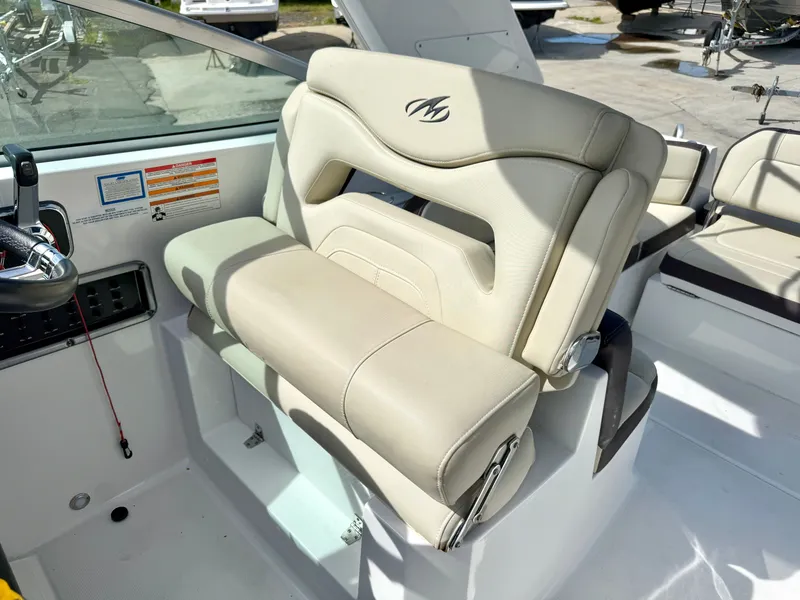 Slide: The Image of Interior of 2019 Monterey SPORT YACHT 295 with beige leather seat. - 12