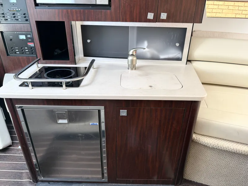 Slide: The Image of Galley area on Monterey SPORT YACHT 295, year 2019. - 16