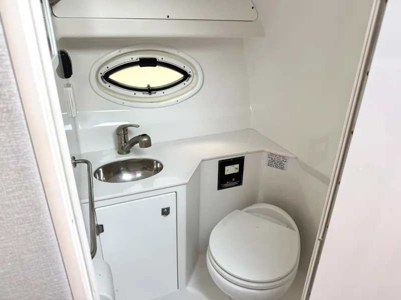 Slide: The Image of Interior of 2019 Monterey SPORT YACHT 295 with sink and toilet. - 18