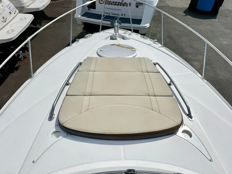 Slide: The Image of 2019 Monterey SPORT YACHT 295 with sun pad on deck. - 20