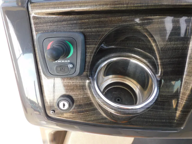 Slide: The Image of Control panel and cup holder on 2019 Monterey SPORT YACHT 295. - 32