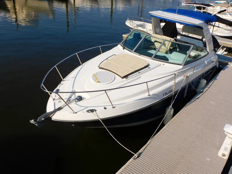 Slide: The Image of 2019 Monterey SPORT YACHT 295 docked, side view. - 4