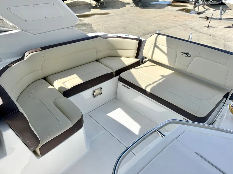 Slide: The Image of Interior of 2019 Monterey SPORT YACHT 295 with beige seating. - 7