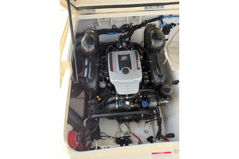 Slide: The Image of Engine compartment of a 2010 Sea Ray 230 Sundeck boat. - 4