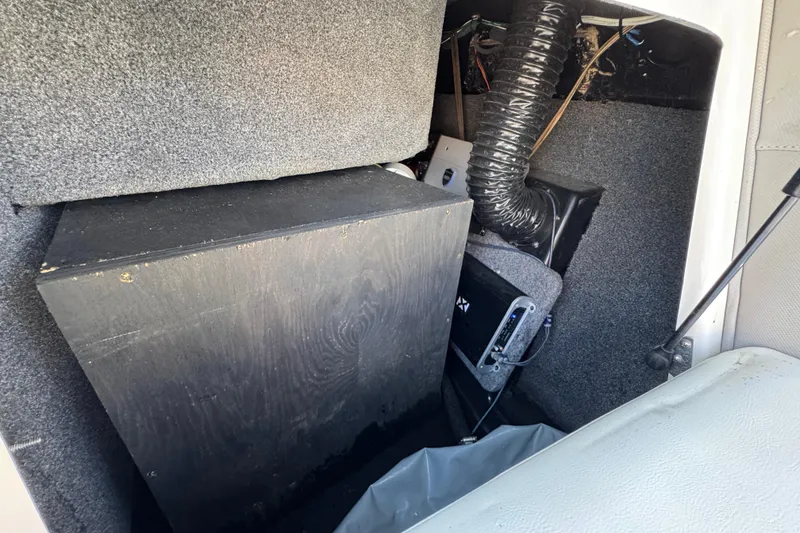 Slide: The Image of Interior view of a 2019 Moomba Max boat showing storage and equipment area. - 15