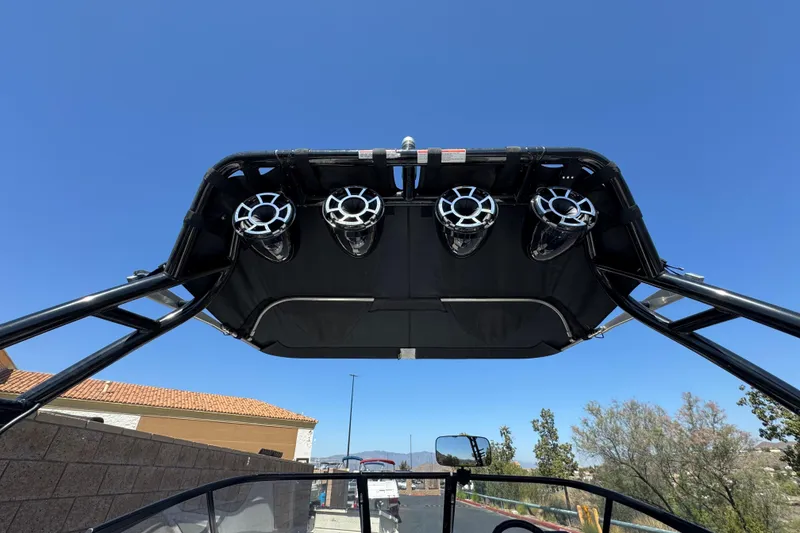 Slide: The Image of 2019 Moomba Max boat with mounted speakers under a clear blue sky. - 17