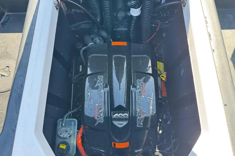 Slide: The Image of 2019 Moomba Max engine compartment featuring a Raptor 6.2L motor. - 24