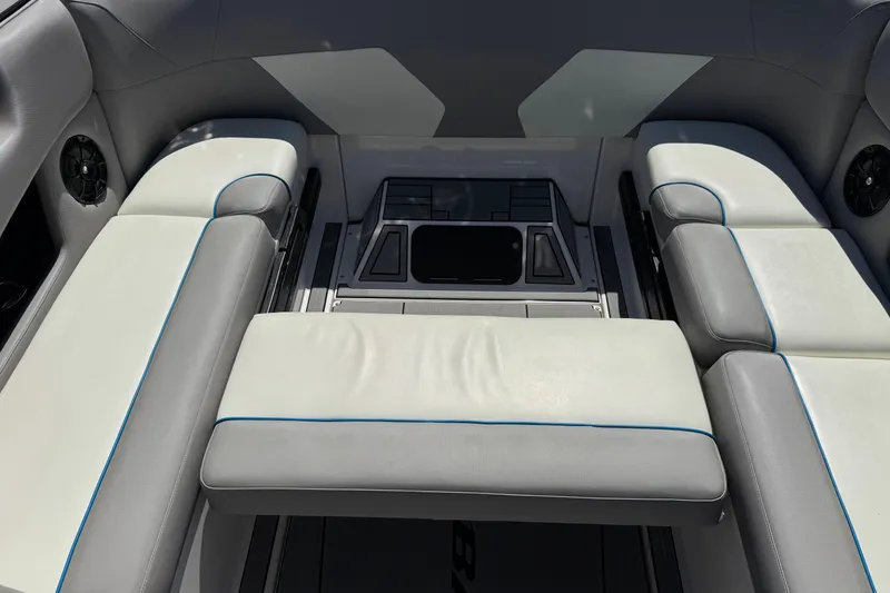 Slide: The Image of Interior seating of 2019 Moomba Max boat with gray and white upholstery. - 25