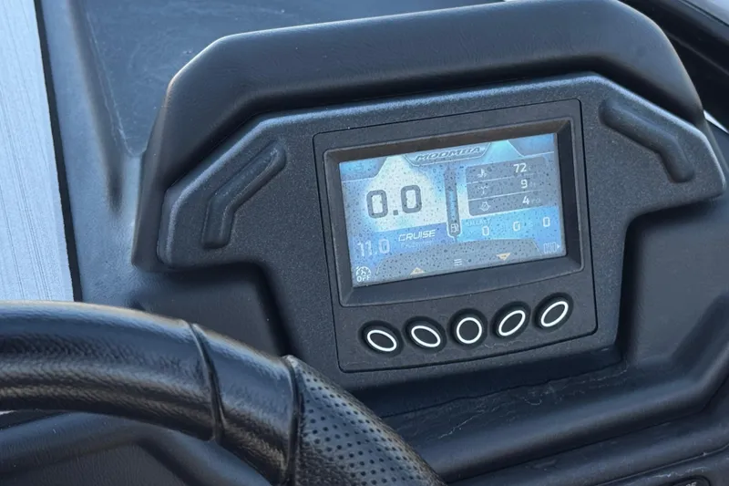 Slide: The Image of Dashboard of a 2019 Moomba Max boat with digital display and controls. - 33