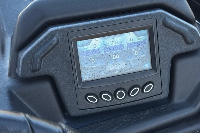 Slide: The Image of Dashboard display of a 2019 Moomba Max boat with control buttons. - 34