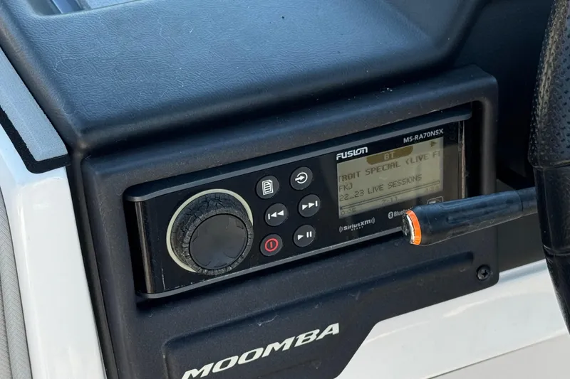Slide: The Image of 2019 Moomba Max dashboard featuring a Fusion MS-RA70NSX stereo system. - 35
