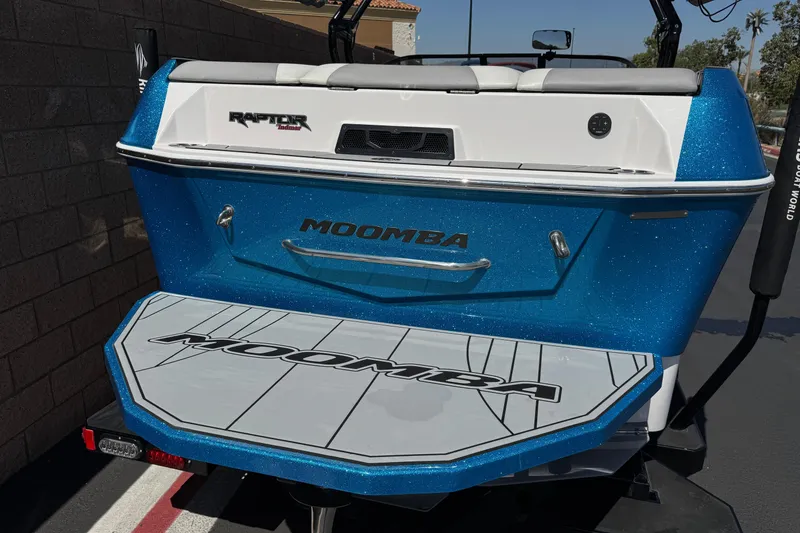 Slide: The Image of 2019 Moomba Max boat with blue glitter finish and Raptor Indmar engine. - 6
