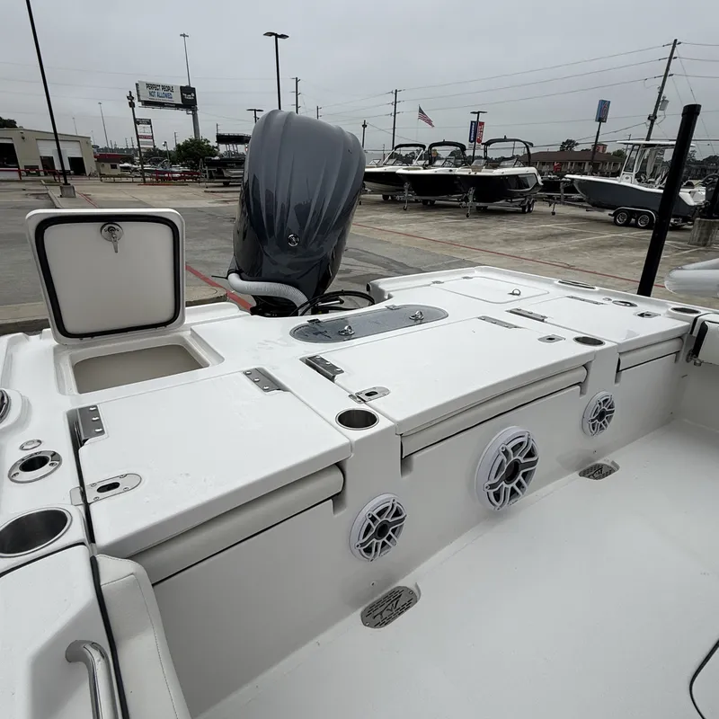Slide: The Image of Tidewater 2500 Carolina Bay 2026 with engine and storage compartments. - 26