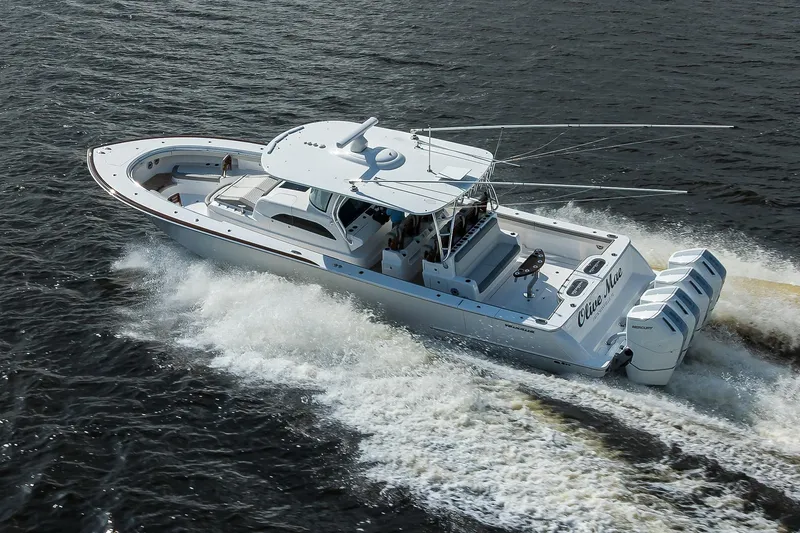Slide: The Image of Valhalla V-46 2026 boat cruising on water with powerful outboard engines. - 1