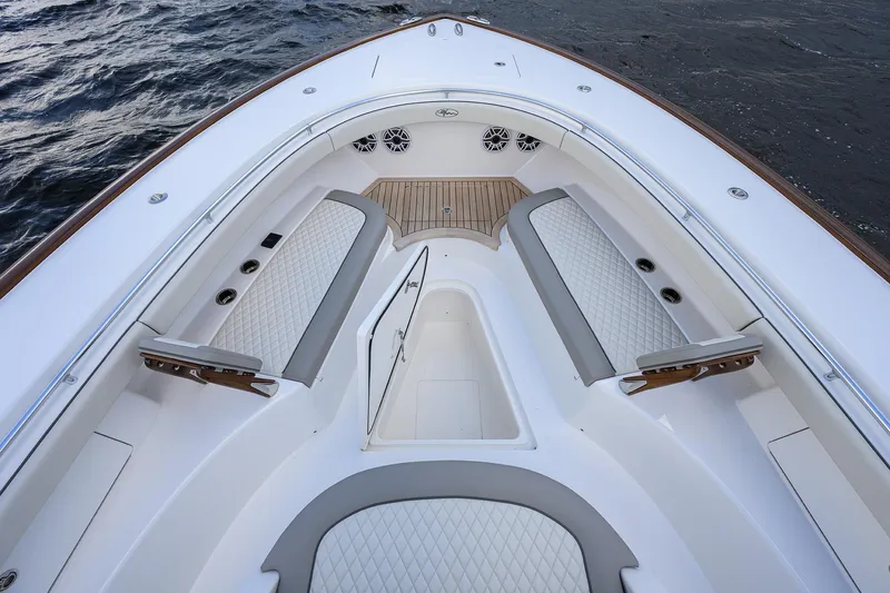 Slide: The Image of Luxurious 2026 Valhalla V-46 boat interior with cushioned seating and elegant design. - 14